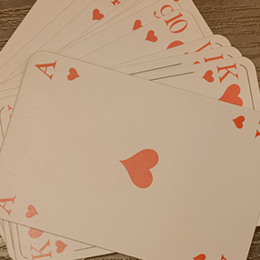 ace-figure and a set of cards completing 21